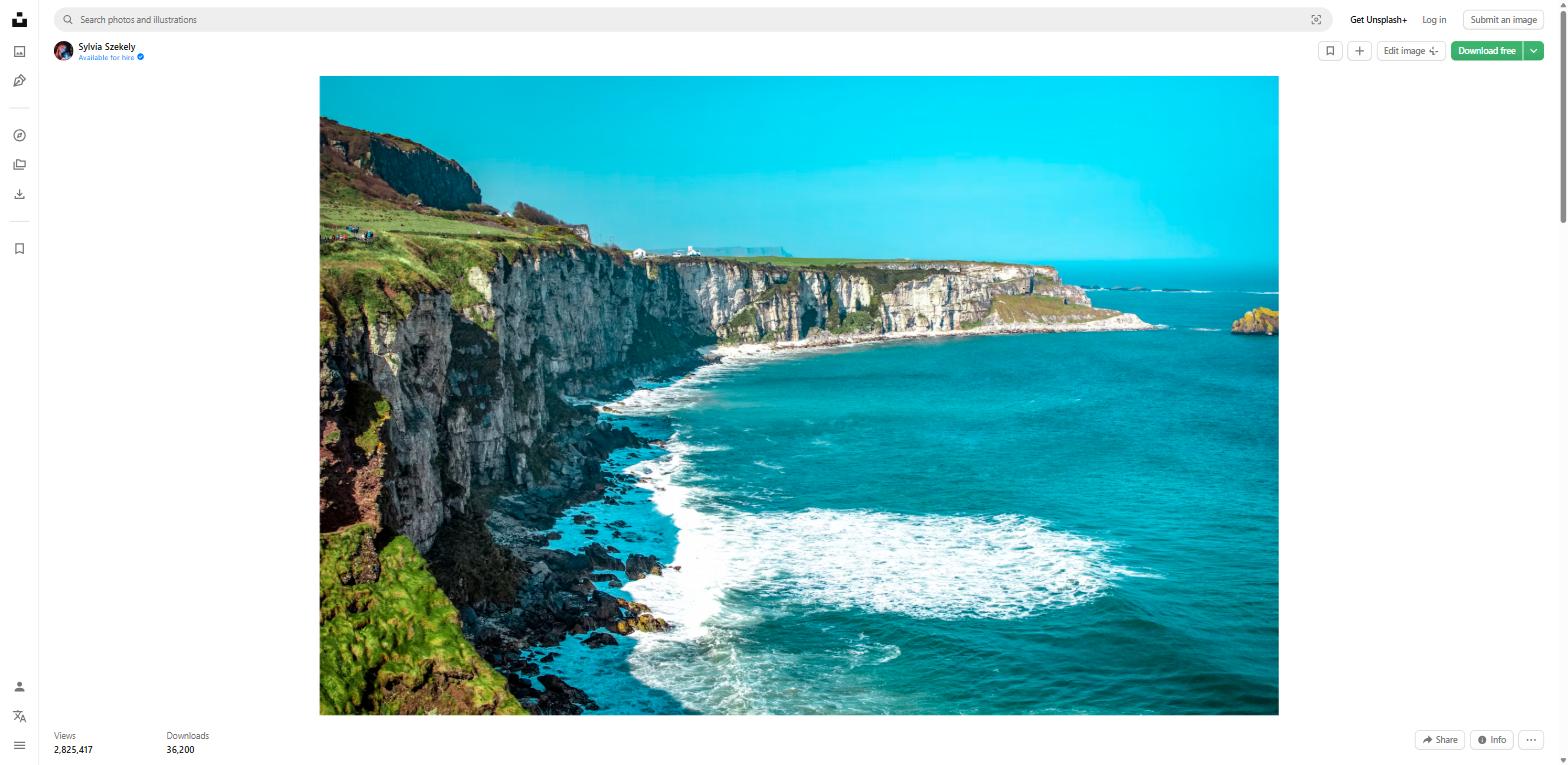 Dramatic white cliffs along Ireland's Wild Atlantic Way with turquoise ocean